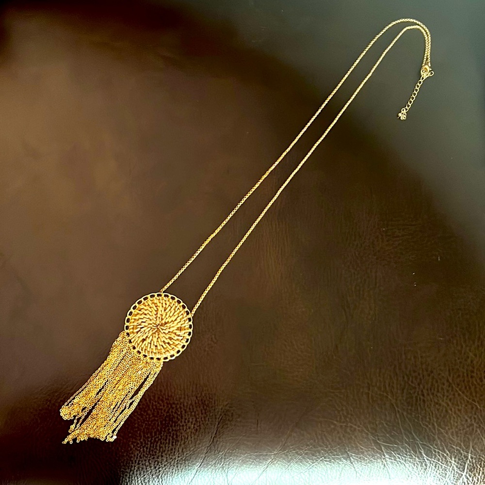 Gold long statement necklace